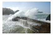 Spay over mullion harbour wall